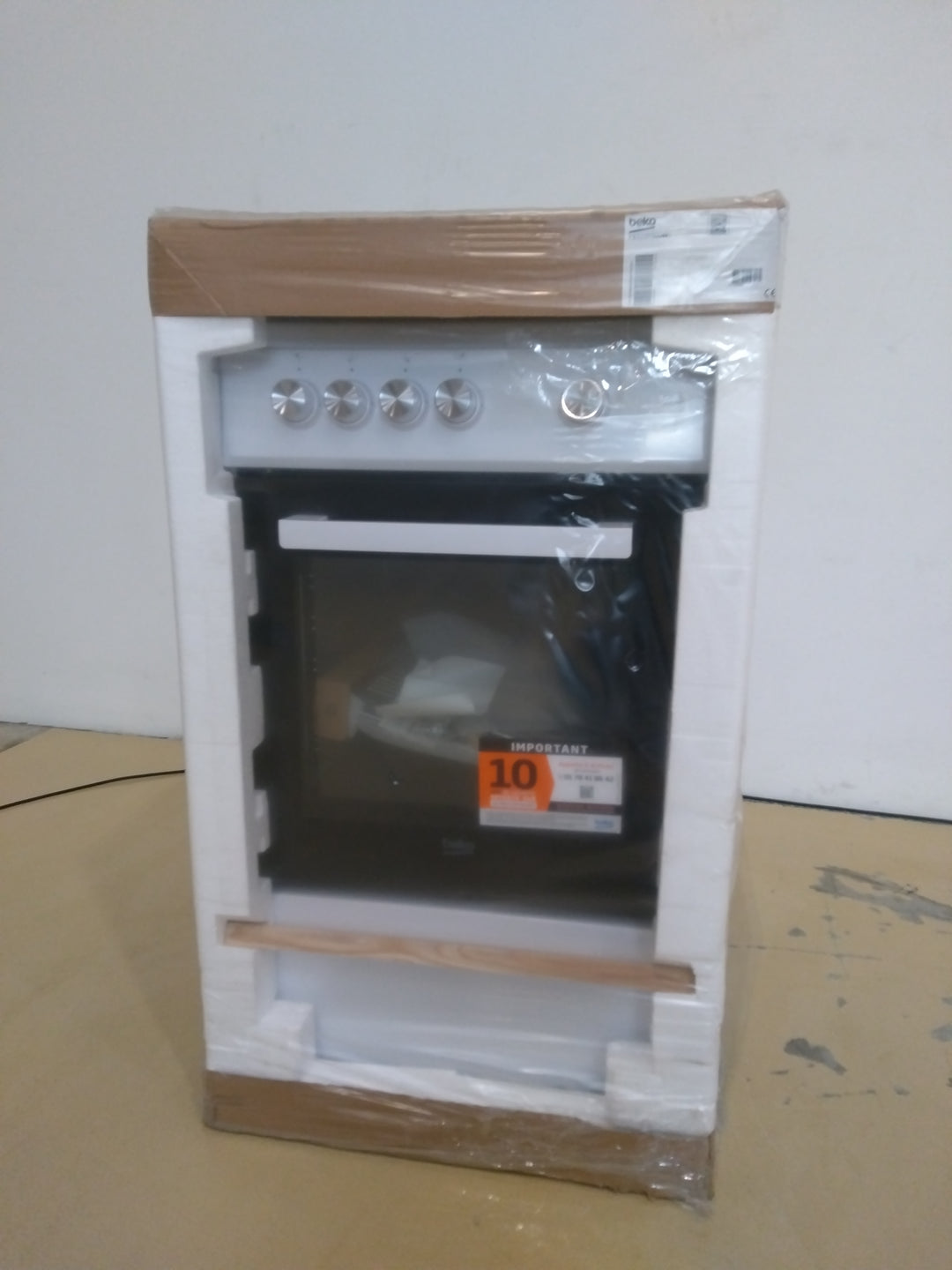 Cuisinière à gaz 4 foyers BEKO FSG52000DWC
