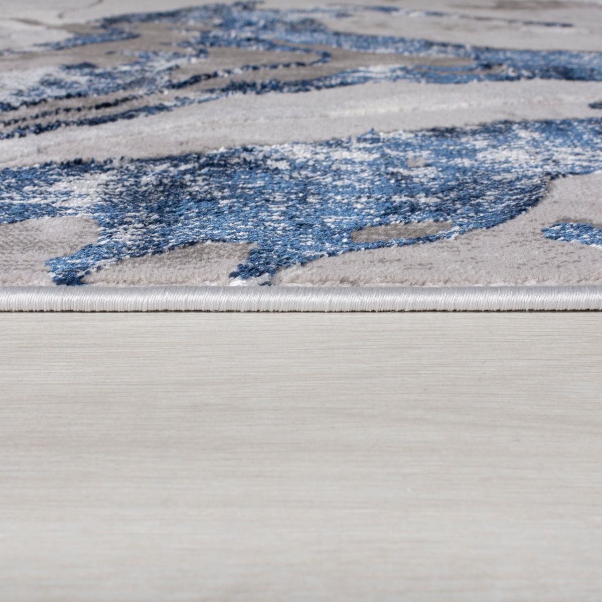 Tapis style effet marbre Bleu