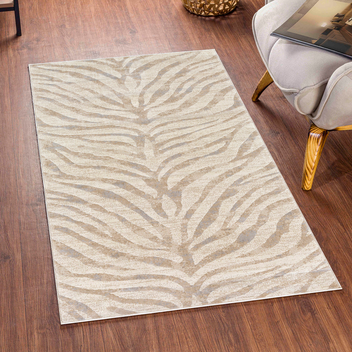 Tapis SURYA Luanda bohème, motif zébré beige et taupe sur fond crème