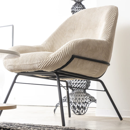 Fauteuil design en velours cotele beige