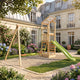 Aire de jeux SOULET Happy Swing & Climbing 120 avec portique 3 agrès et toboggan — en situation