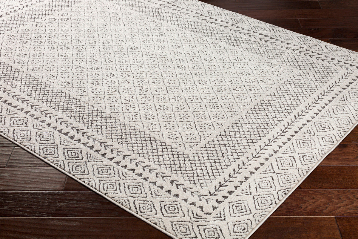 Tapis rond SURYA Monaco géométrique, bordure de losanges anthracite sur fond beige clair, vue 12