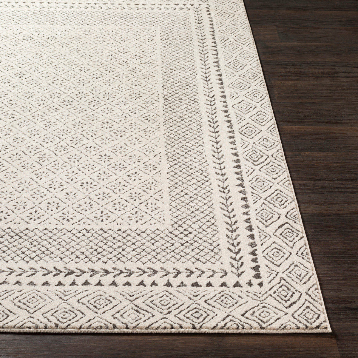 Tapis rond SURYA Monaco géométrique, bordure de losanges anthracite sur fond beige clair, vue 5