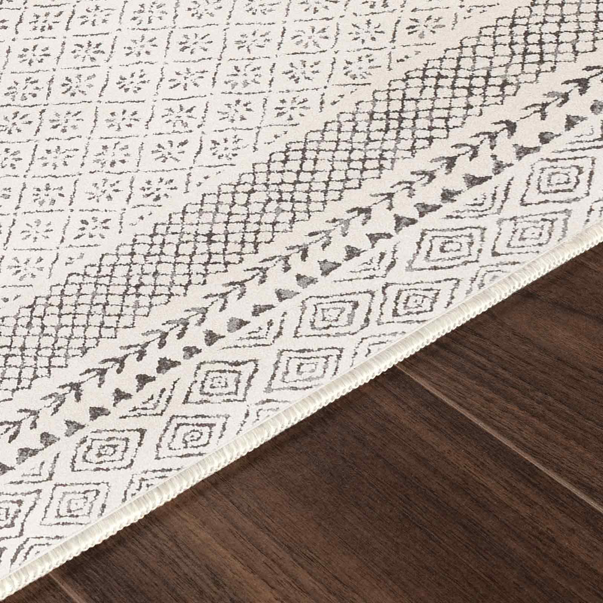 Tapis rond SURYA Monaco géométrique, bordure de losanges anthracite sur fond beige clair, vue 10