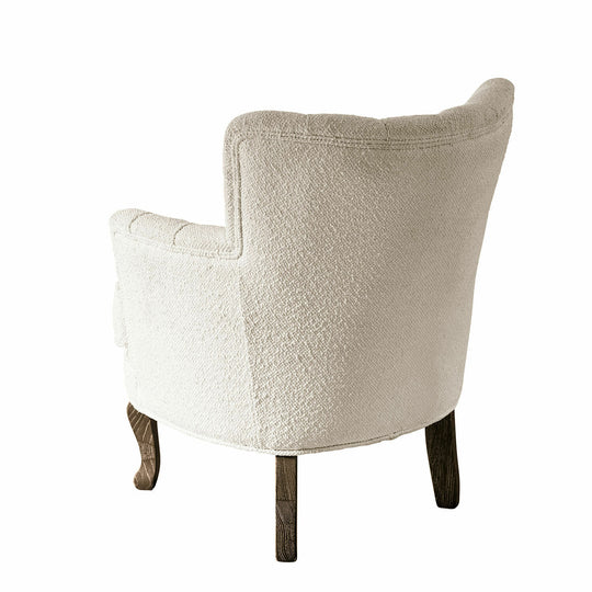 Fauteuil capitonné LOBERON Calgary en tissu bouclette crème — photo produit