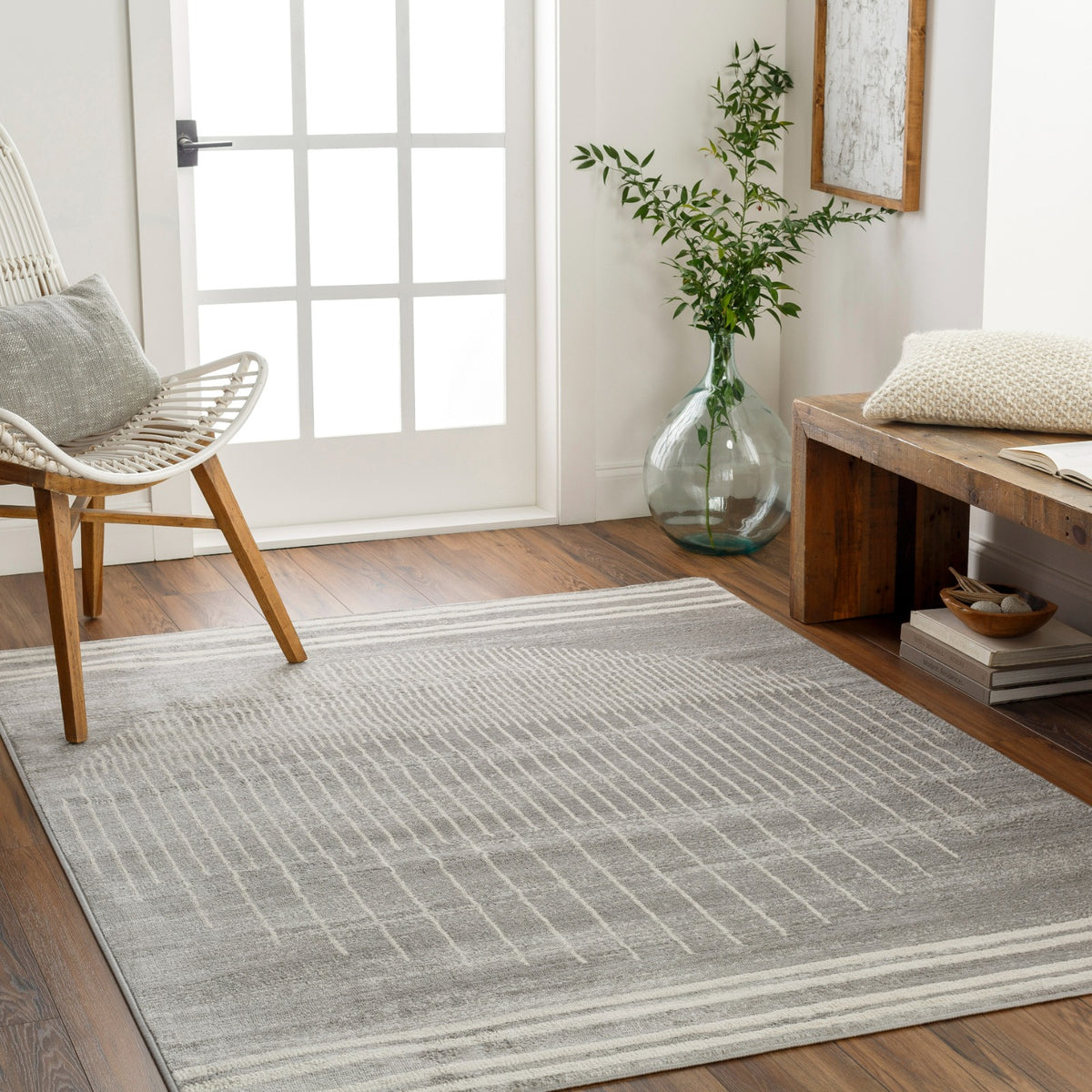 Tapis SURYA Santiago géométrique, motif de lignes fines et formes arrondies gris et beige
