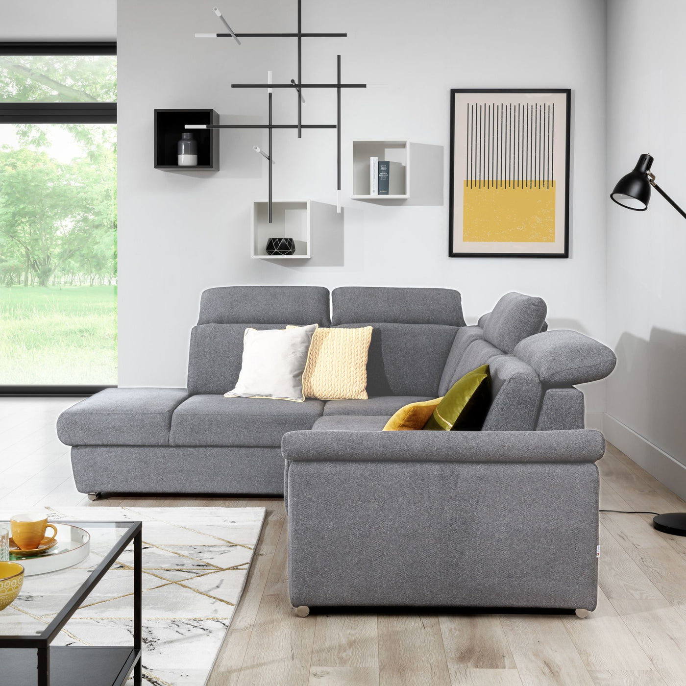 Canapé d'angle gauche convertible LES TENDANCES Kepita en tissu Gris clair chiné avec appuis-tête réglables et rangement