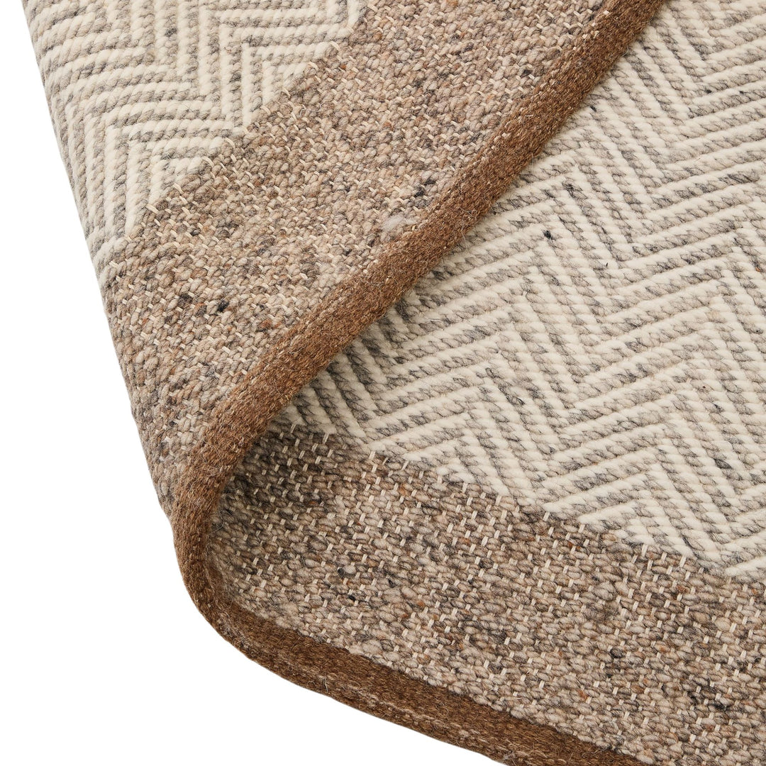 Tapis KAVE HOME Nifelia jacquard en laine beige 200x300cm
